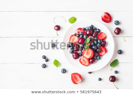 商業照片: Tropical Fruits Assortment On A Plate Top View