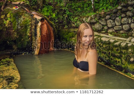 [[stock_photo]]: Young Woman Tourist In Belulang Hot Springs In Bali Village Mengesta Penebel District Tabanan Reg