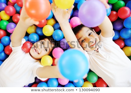 Stok fotoğraf: Two Brothers Having Fun Playing With Ball