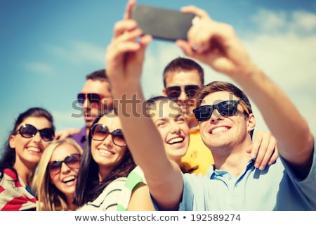 Foto stock: Happy Young People Group Have Fun On Beach