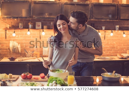 Stockfoto: Happy Couple Making A Salad