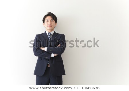 Foto stock: Portrait Of Confident Businessman With Folded Arms