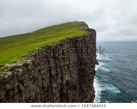 Foto stock: Romantic Steep Cliff With Lake