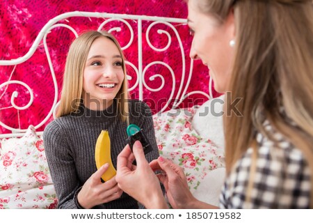 Mother Talking To Teenage Daughter About Contraception Stockfoto © Kzenon