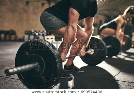 Stock fotó: Weight Lifting In The Gym
