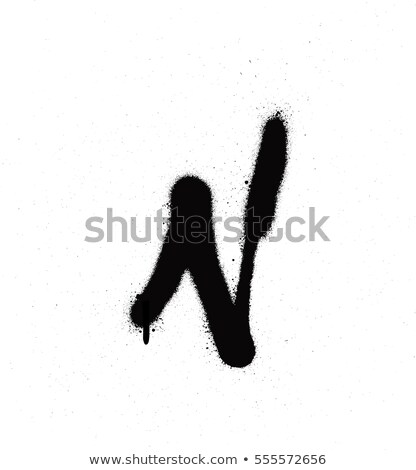 Foto stock: Sprayed N Font Graffiti With Leak In Black Over White