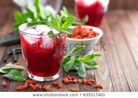 Stockfoto: Healthy Detox Drink With Goji Berries Infused In Water With Ice Cold Refreshing Beverage