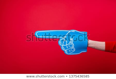 Stok fotoğraf: Gloves In Foam On A Blue Background