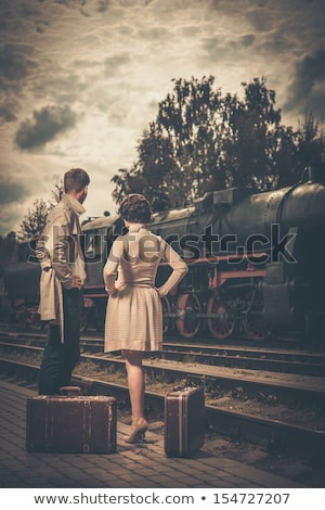 Zdjęcia stock: Young Attractive Fashion Lady On Railway Station Waiting Vintag