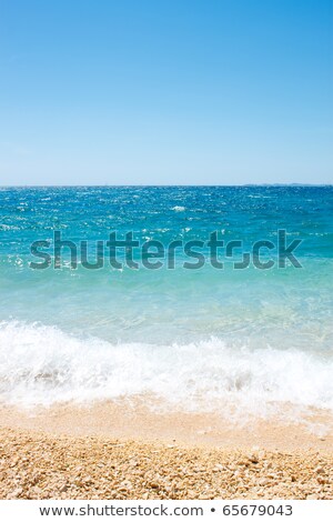 Sea View Pebble Beach And Turquoise Water Tranquil Scene Zdjęcia stock © Artush