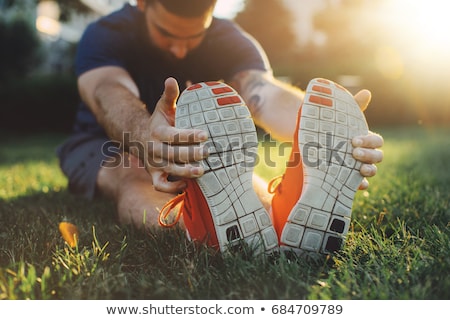 Stock fotó: Jogger Stretching