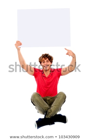 Stock fotó: Seated Casual Man Holds A Blank Board