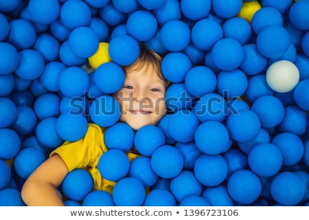 Foto stock: Child Playing In Ball Pit Colorful Toys For Kids Kindergarten Or Preschool Play Room Toddler Kid