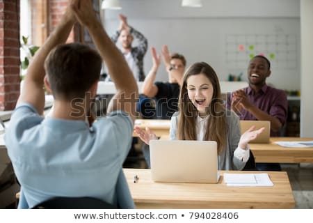 Stock photo: Colleagues Applauding To Female Office Worker