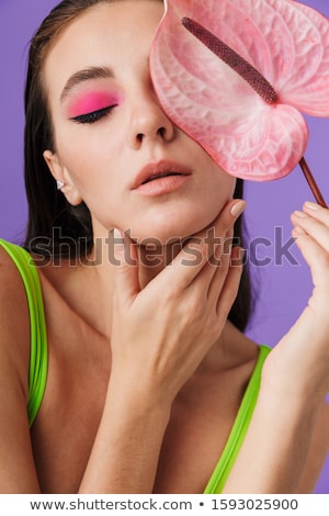 Foto stock: Photo Closeup Of Young Fashion Woman Holding Exotic Flower