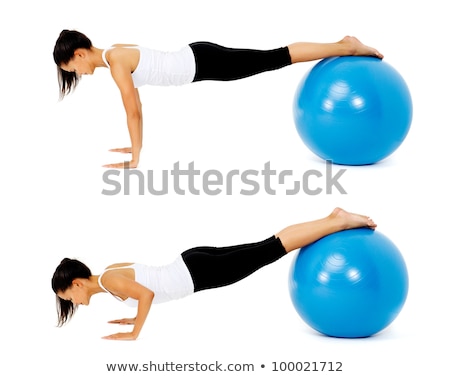 Stock photo: Portrait Of Fit And Healthy Woman With Toning Ball At Fitness Cl