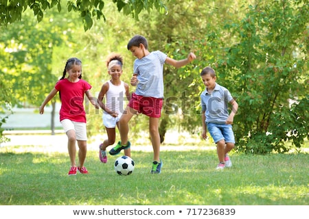 Zdjęcia stock: Kids Playing Soccer