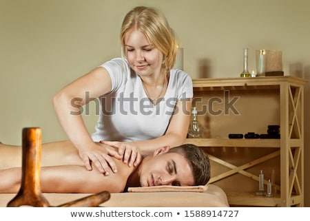 Foto stock: Attractive Young Woman On Massage Table