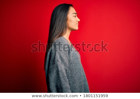 Stock photo: Profile View Of A Red Haired Woman