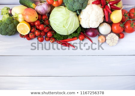 ストックフォト: Fresh Onion In Basket On Wooden Table Top View