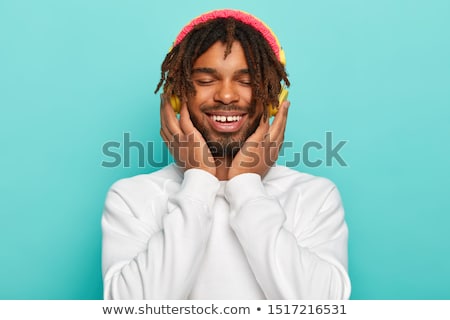 Stock foto: Close Up Of A Delighted Young Man Dressed In Sweater