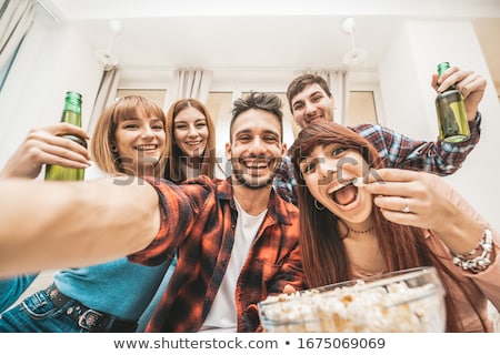 Stockfoto: Female Friends Taking Selfie By Smartphone At Home