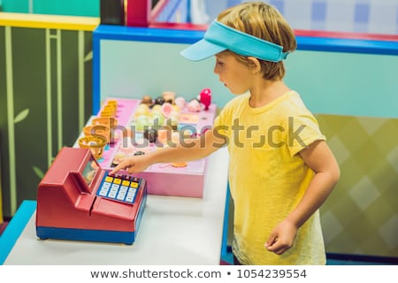 Stockfoto: Children Play As Ice Cream Seller