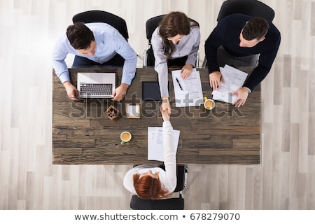 Foto stock: Female Recruiter Looking At Candidate