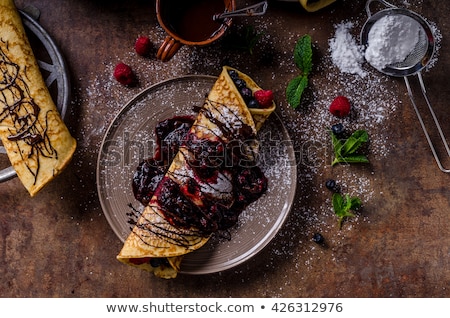 Foto d'archivio: Pancakes Crepes On Dark Background