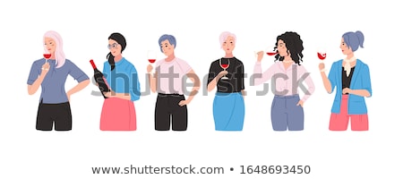 Stok fotoğraf: Professional Female Sommelier Evaluating Smell And Taste Of Red Wine