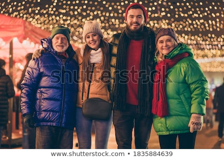 ストックフォト: Family Visiting Christmas Market