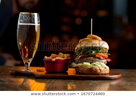 Stock photo: Beef Burger In Homemade Pizza Dough Bun With Bbq Sauce Melted C