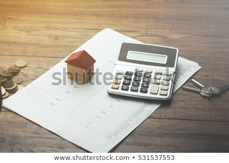 Foto stock: Sale House And Calculator