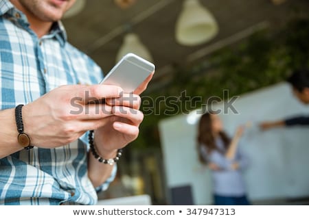 Stok fotoğraf: Businessman Talking On A Mobile Phone