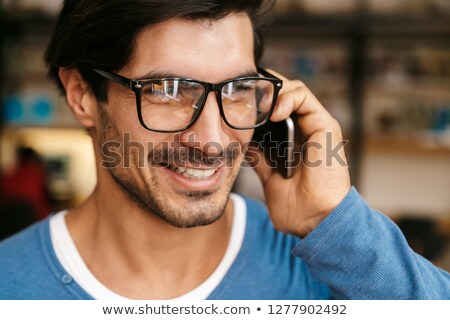 Stok fotoğraf: Close Up Of Smiling Businessman With Smartphone