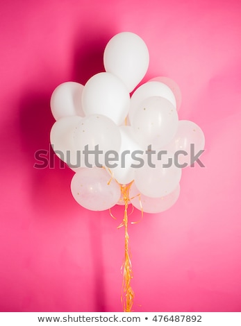 Stockfoto: Close Up Of White Helium Balloons Over Pink