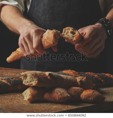 Stockfoto: Male Hands Break The Baguette