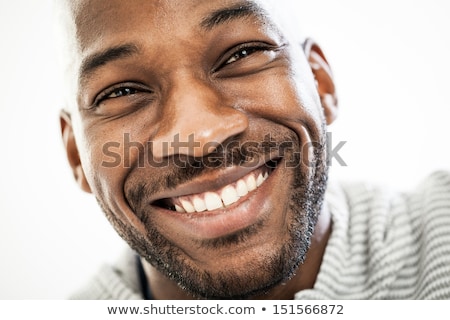 Stok fotoğraf: Close Up Portrait Of Smiling African Man Looking At Camera