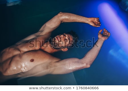 Stock photo: Floating Tank With Blue Water