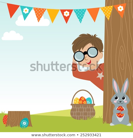 Stok fotoğraf: Cartoon Boy On An Easter Egg Hunt