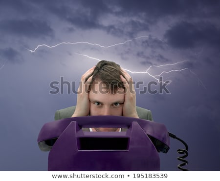 Foto d'archivio: Businessman Expecting Important Call On Phone