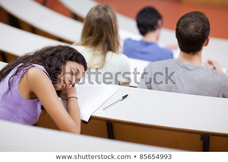 Stok fotoğraf: Bored Student Sleeping During A Lecture