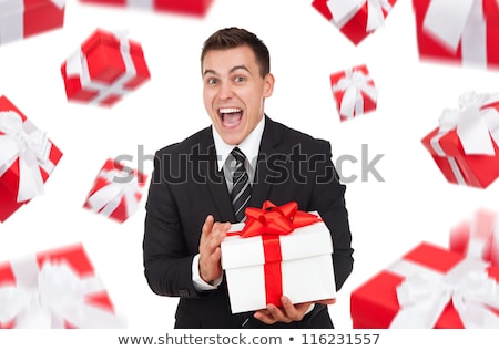 Stok fotoğraf: Portrait Of Young Business Man With Gifts