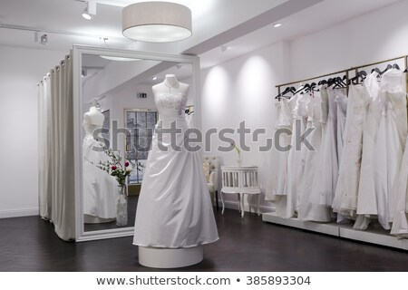 [[stock_photo]]: Beautiful Cocktail Dress On Mannequin In A Bridal Shop