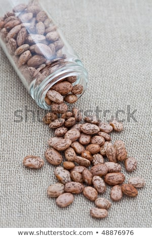 Stock photo: Small Glass Jar With Pinto Beans