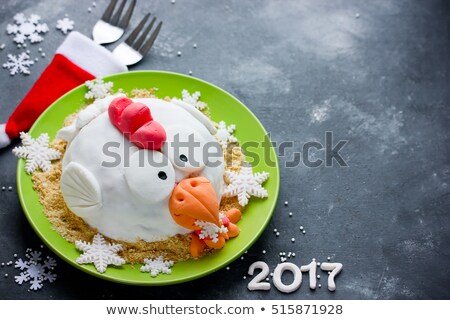 Foto stock: Text Happy 2017 Topping A Cake