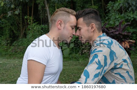 ストックフォト: Homosexual Men Showing Love Gay People Holding Hands