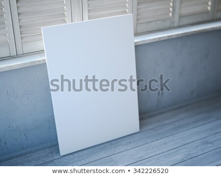 Stok fotoğraf: Blank White Canvas Near The Windows With Shutters