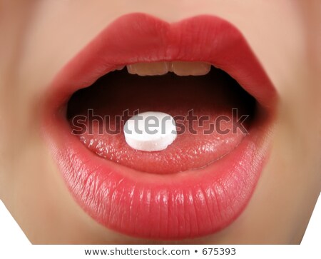 Oral Pill On A Woman Tongue Foto d'archivio © gvictoria