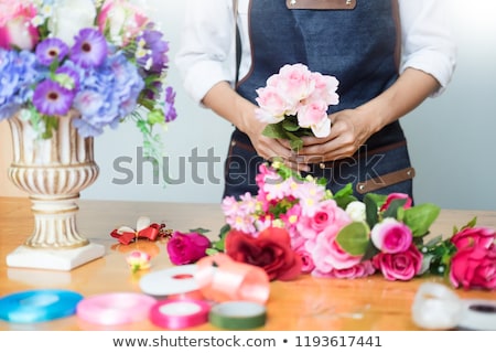 [[stock_photo]]: Female Florist At Work Using Arranging Making Beautiful Artifici